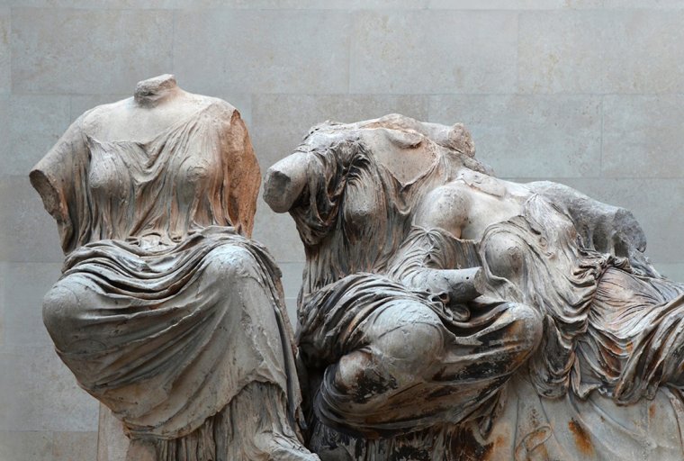 Three female figures from the Parthenon east pediment at the British Museum.