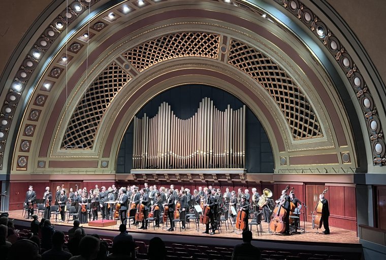 The U-M Life Sciences Orchestra on stage at Hill Auditorium