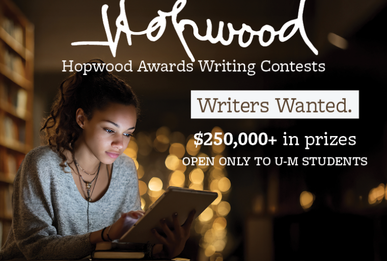 A young woman writes on a tablet with a bookcase in the background.