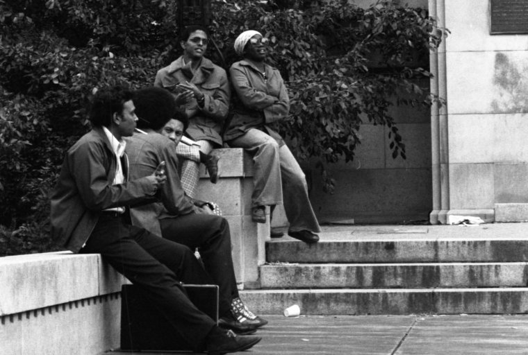Students relaxing on steps of Michigan Union.