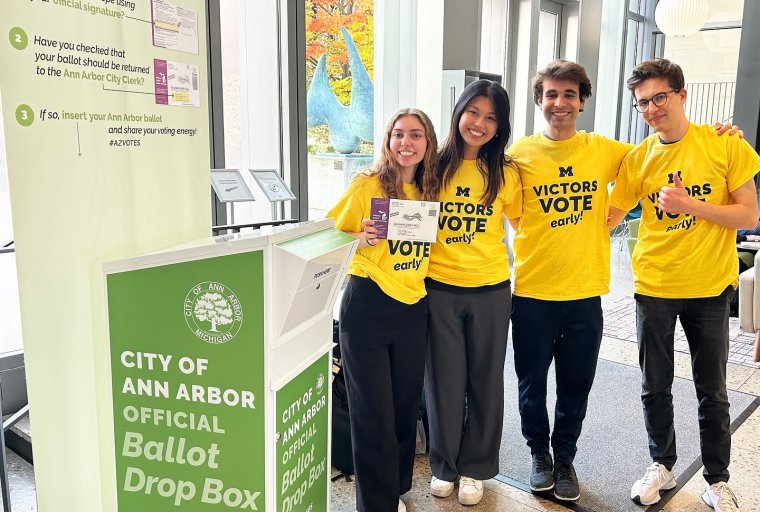 Students at the Campus Voting Hub wearing Victors Vote Early t-shirts