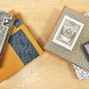 Several books adorned with decorative paper.