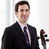 Faculty Master Class: Amir Eldan, cello (headshot with instrument)