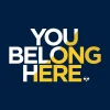 You Belong Here Logo with blue background and words stacked with small bee at end.