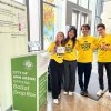 Students at the Campus Voting Hub wearing Victors Vote Early t-shirts