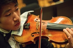 LSO concertmaster and U-M medical student Daniel Choi