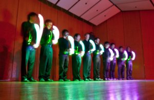 Students perform an original piece with mobile phones as instruments.
