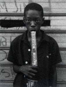 Dawoud Bey, A Boy Eating a Foxy Pop, Brooklyn, NY, 1997, gelatin silver print, U Dawoud Bey, A Boy Eating a Foxy Pop, Brooklyn, NY, 1997, gelatin silver print, U