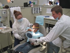 In addition to receiving oral health care, children also learn how to brush thei