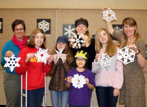 Photograph of workshop participants with Gifts of Art’s Kathi Talley, courtesy o