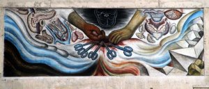Diego Rivera mural of two hands with surgery tools and organs in background.