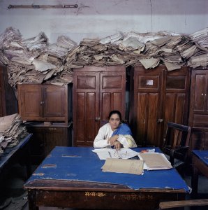 Office worker in India by Jan Banning