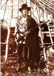 Bugonaygeshig with his necklace of spent cartridges from the Battle at Sugar Point