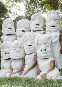 photo of a group of women wearing masks