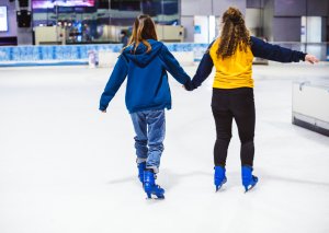two girls ice skates