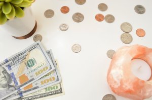 Money styled stock photo and money flat lay photo for personal finance bloggers, business coaches, and entrepreneurs.