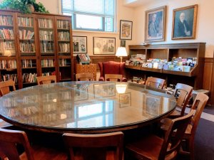Hopwood Room with round table and bookcases