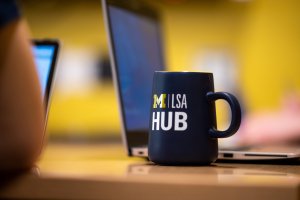 LSA Hub mug and laptop