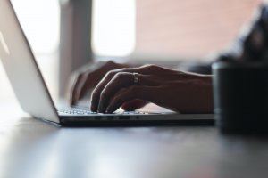 Typing on a mac, Photo by Thomas Lefebvre on Unsplash