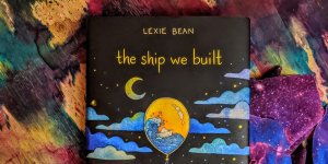 Cover of The Ship We Built, which features night sky and hot air balloon.