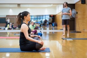 Students focus on clarity and well-being in Yoga Flow.