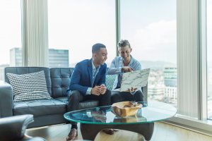 A talent representative talking with a client
