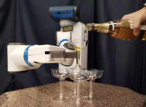 Robot holds a champagne glass