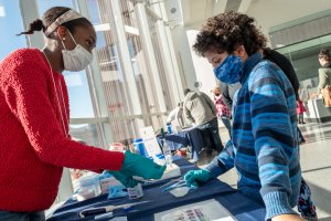 University of Michigan scientists share their cutting-edge research with museum visitors. Photo courtesy of University of Michigan Museum of Natural History/Michelle Andonian.