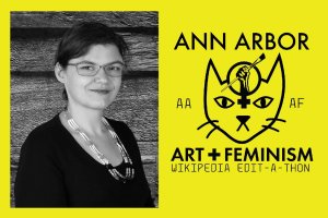 Ellie Mitchell and the Ann Arbor Art + Feminism cat by Breanna Hamm.