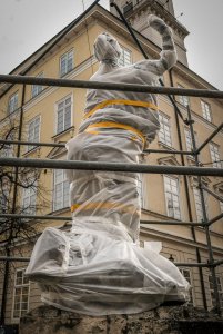 public statue wrapped in fireproof material, as of March 2022, Lviv, Ukraine