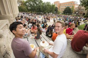 Students eating at picnic on Angell Hall steps