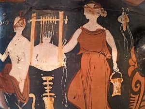 ancient Greek krater featuring an image of a woman and a loom