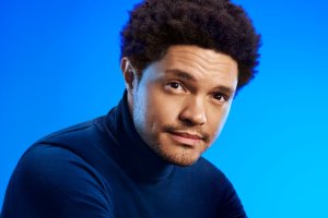 Trevor Noah on a blue background