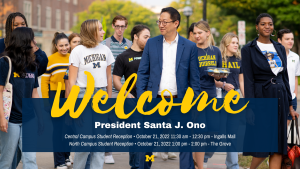 President Santa J Ono walks Central Campus surrounded by students on a fall day. President Santa J Ono walks Central Campus surrounded by students on a fall day.