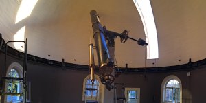 Image of a telescope and surrounding dome. Image of a telescope and surrounding dome.