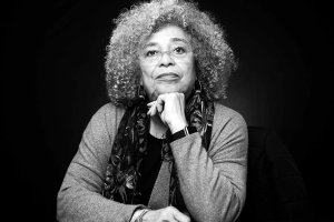 Image of Angela Davis with head resting on her fist.