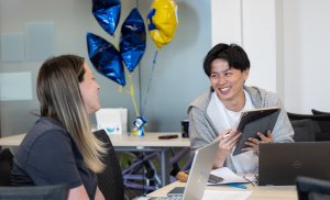 UM students laughing and workshopping