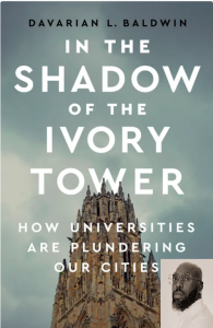 a gothic building against a cloudy blue-gray sky with a book title in white letters