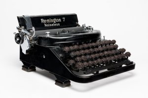 A vintage Remington 7 &quot;Noiseless&quot; typewriter, with keys covered by circles of dark, human hair