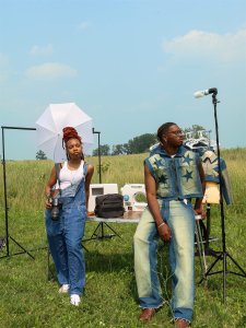 Nina Rachelle (left) and Bryan Wilson (right) pose in a field wearing their own fashions