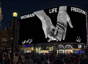 “Woman, life, freedom” – bilingual English-Persian billboard display, Piccadilly Circus, London (Image credit: Xanyar)
