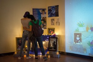 Visitors at the collective altar in the temporary exhibition of the Museum at the Institute of History of Nicaragua and Central America, IHNCA, UCA, 2019