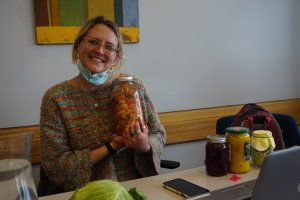 A student engaged in a food preservation activity