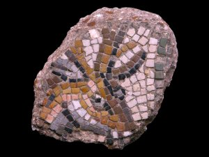 Mosaic tesserae of white and colored marble depicting the head of a deer.