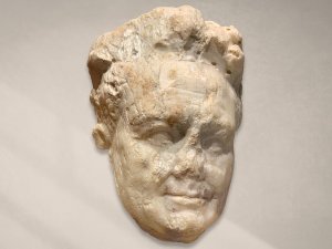 Marble relief fragment of the head of the Roman emperor Vespasian.