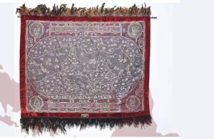 "Both Poles Serve You," embroidery and feathers on fabric, by Cian Dayrit, 2021, photo by Sami Sasso.