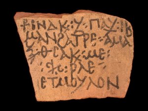 Ceramic fragment with inscription.
