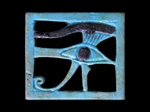 Faience eye of horus amulet (wedjat).