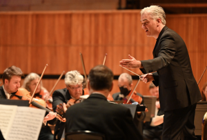 The London Philharmonic mid performance, Edward Gardner conducting.