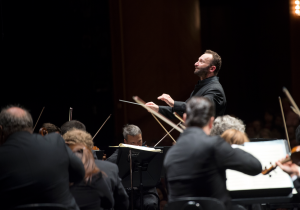 Kirill Petrenko conducting the Berlin Philharmonic orchestra.